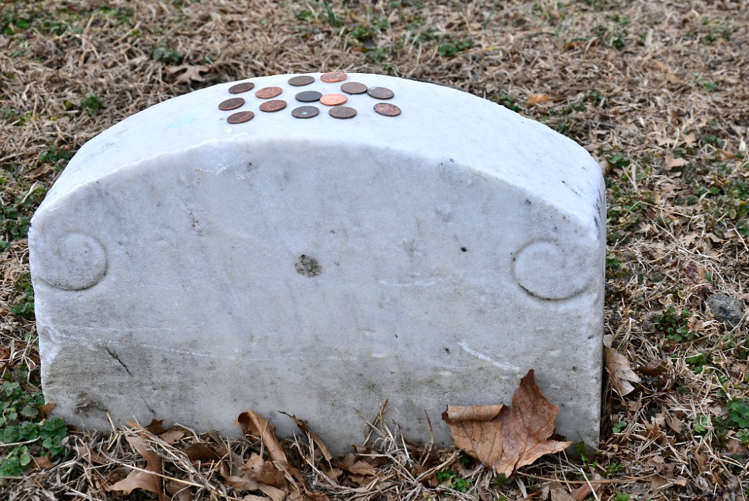 Pennies on the Unmarked Booth Grave Pennies on the Unmarked Booth Grave