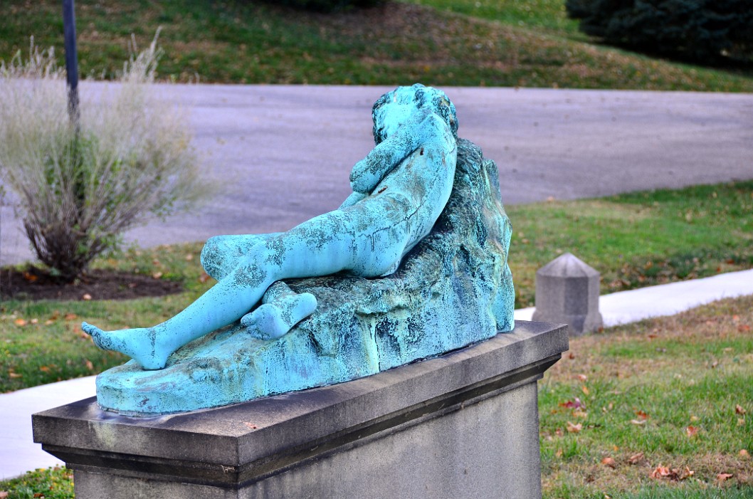 Sleeping Child on the W. H. Rinehart Memorial. Rinehart Sleeping Child on the W. H. Rinehart Memorial. Rinehart