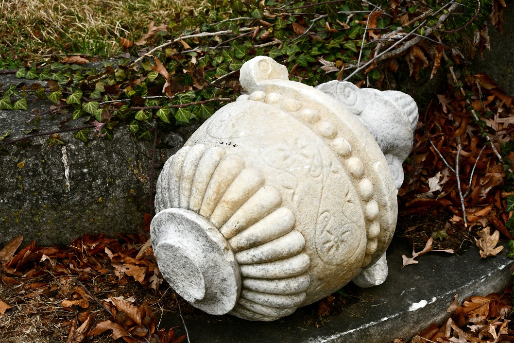White Stone Urn Fallen
